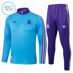 Levné Dětský Real Madrid Tréninkové teplákové soupravy Čtvrt-Zip 2025-26 Modrá Levné Dětský Real Madrid Tréninkové teplákové soupravy Čtvrt-Zip 2025-26 Modrá